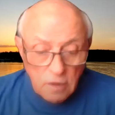 Screen capture of online YouTube and Zoom guided meditation on aligning with your higher self lead by Andy R.Sc.P. for New Thought community in Chico Ca image of older man wearing blue shirt talking